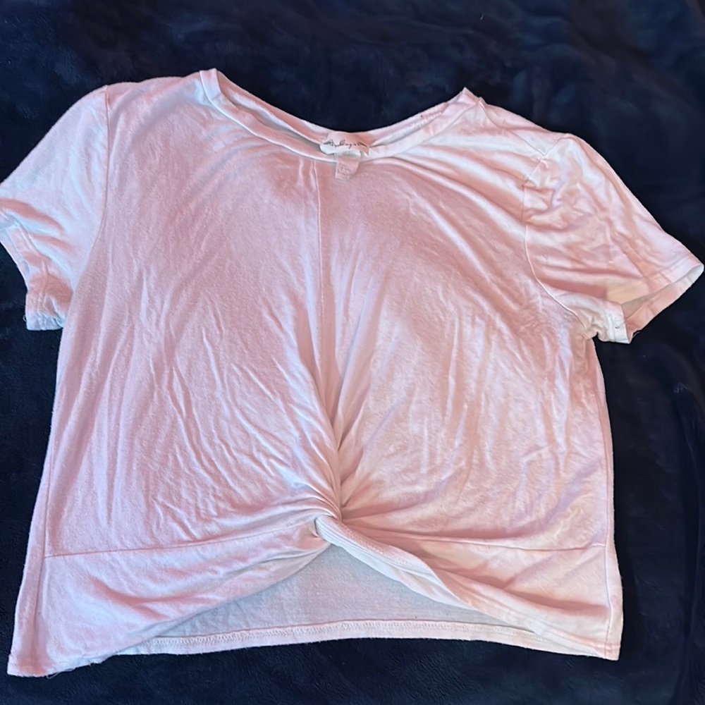 cropped white shirt with twist in the front.